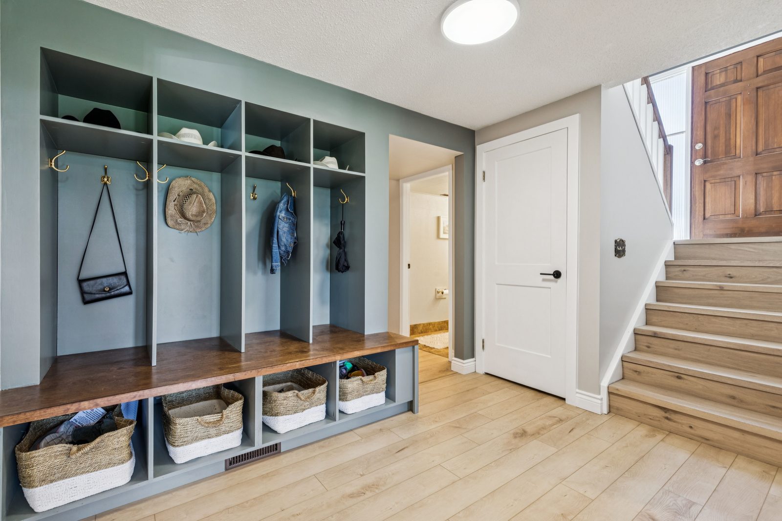 Mudroom with locker-style built-ins